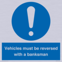 vehicles-must-be-reversed-with-a-banksman~